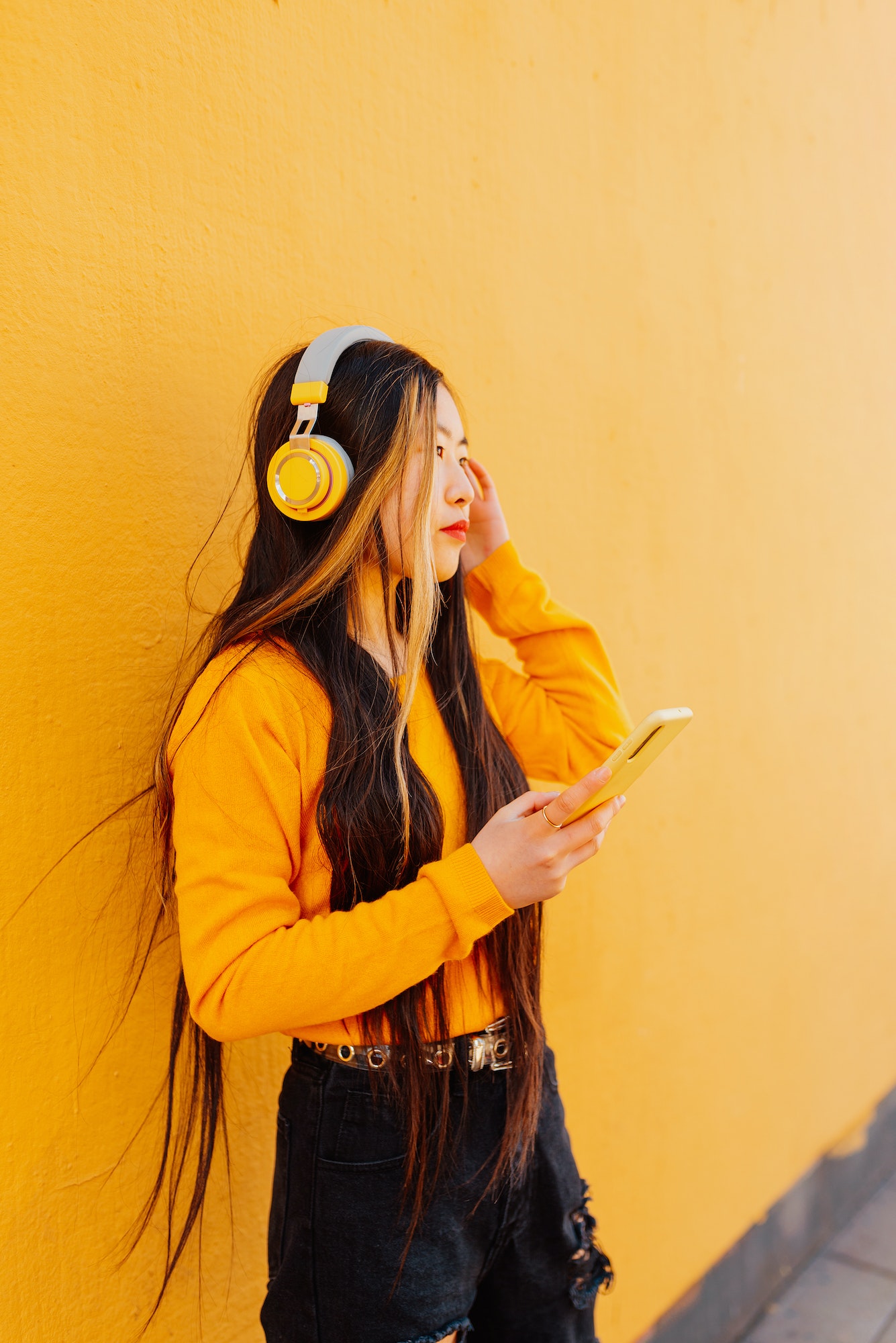 asian girl listening to music