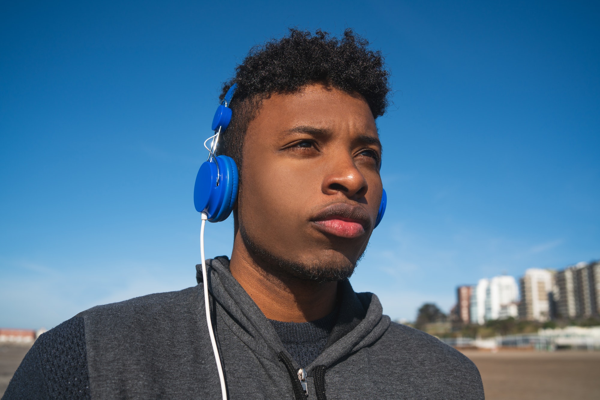 Athletic man listening to music.
