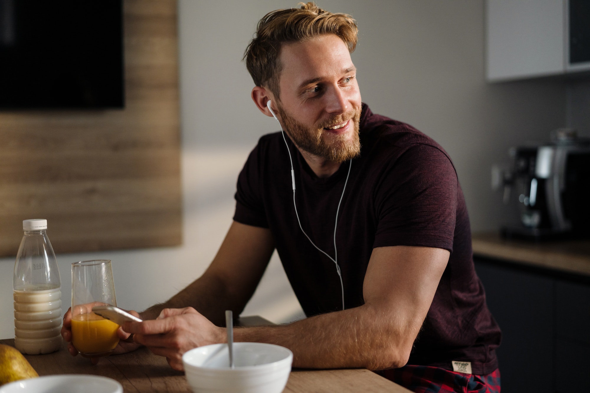 Handsome young man listening to music
